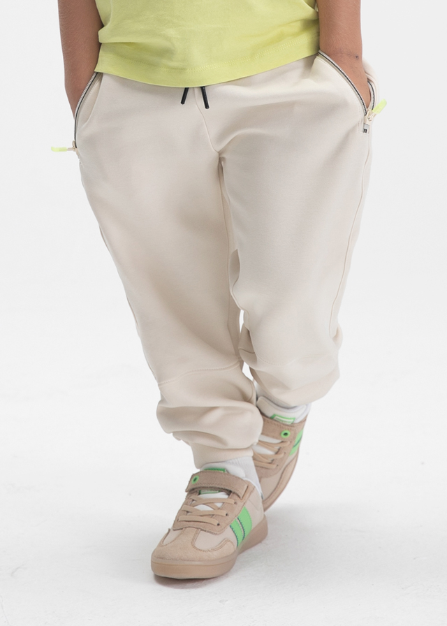 Pantalon Jogger Color Hueso con Cortes